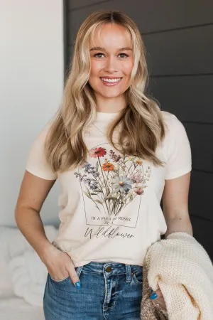 "In A Field Of Roses, Be A Wildflower" Graphic Tee- Natural